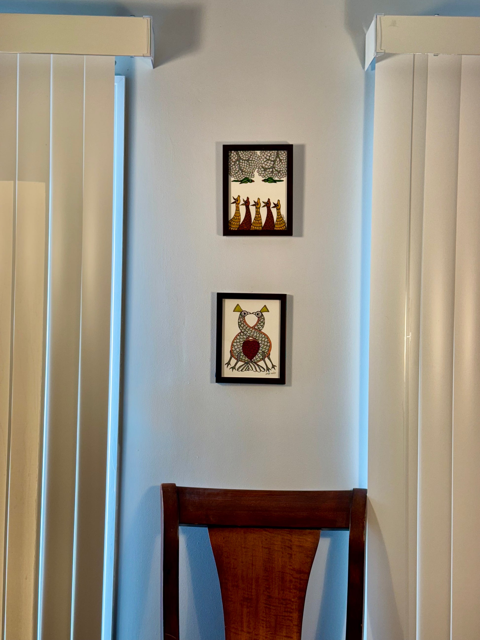 Hand-painted Gond art wall decor featuring intricate tribal patterns and vibrant storytelling inspired by nature and folklore.