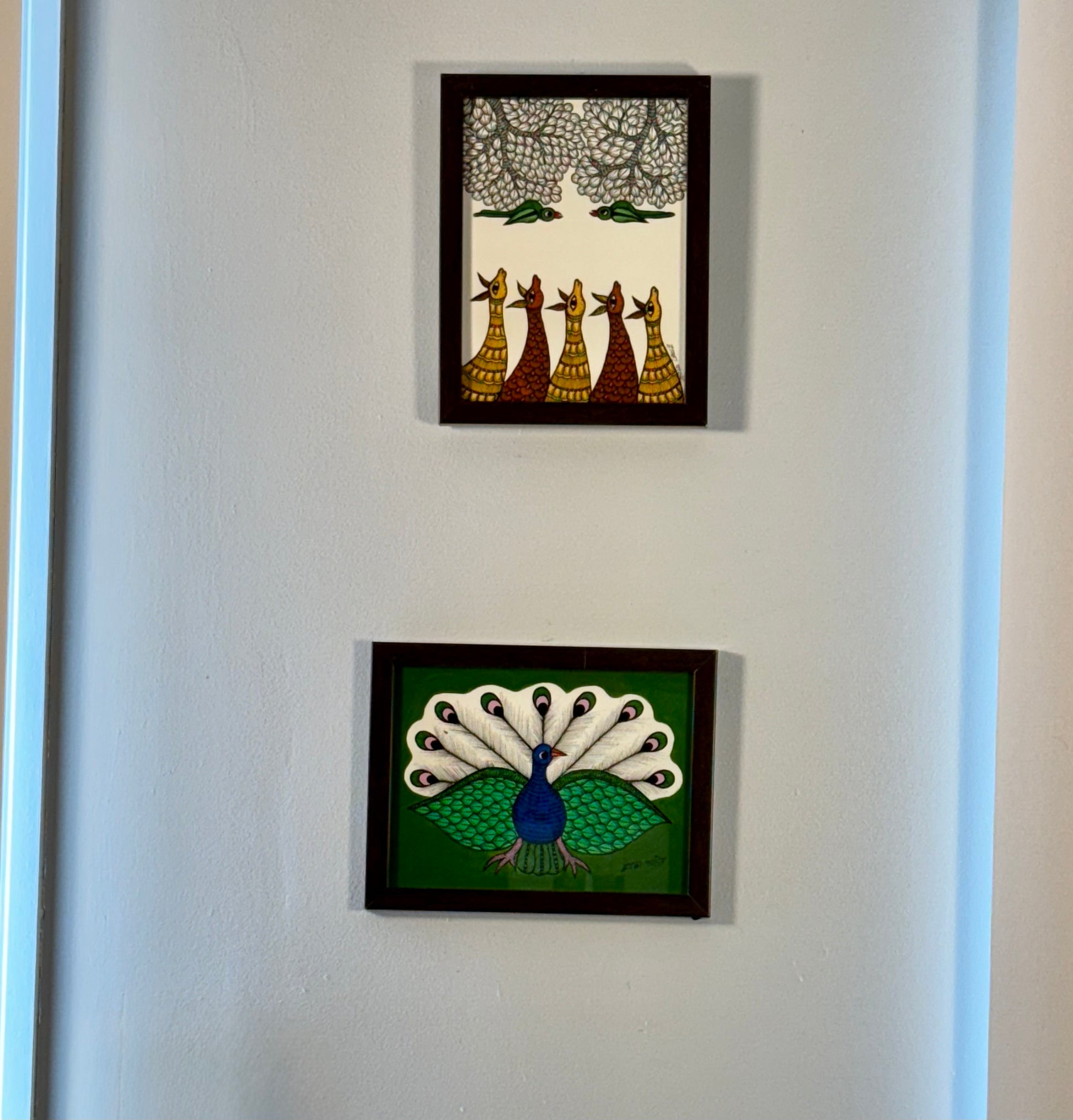 Hand-painted Gond art wall decor featuring intricate tribal patterns and vibrant storytelling inspired by nature and folklore.