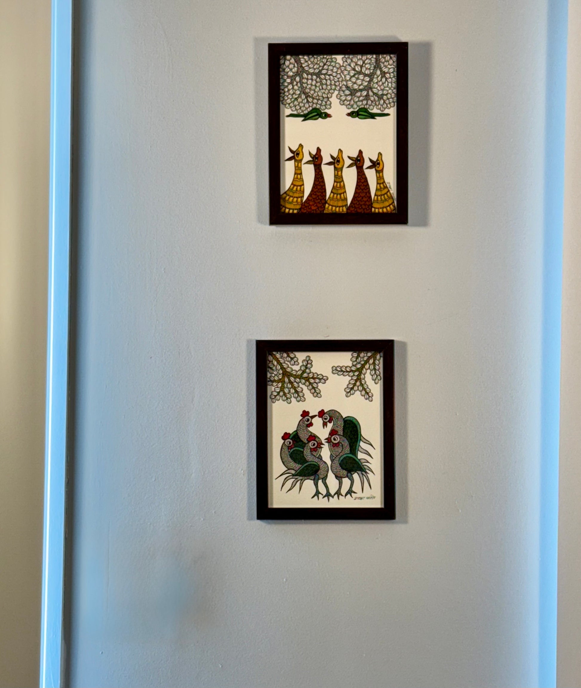 Hand-painted Gond art wall decor featuring intricate tribal patterns and vibrant storytelling inspired by nature and folklore.