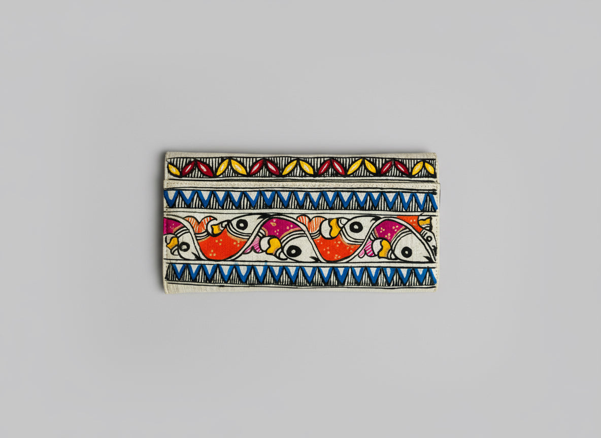 Decorative Madhubani hand painted clutch bag wallet with three fishes pattern  on a woven fabric background