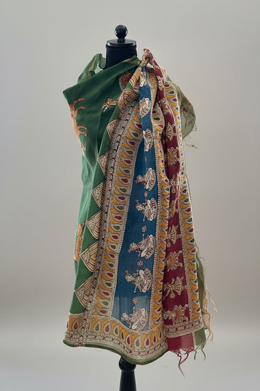 Colorful Mata ni Pachhedi hand painted on a cotton stole on a mannequin against a plain background