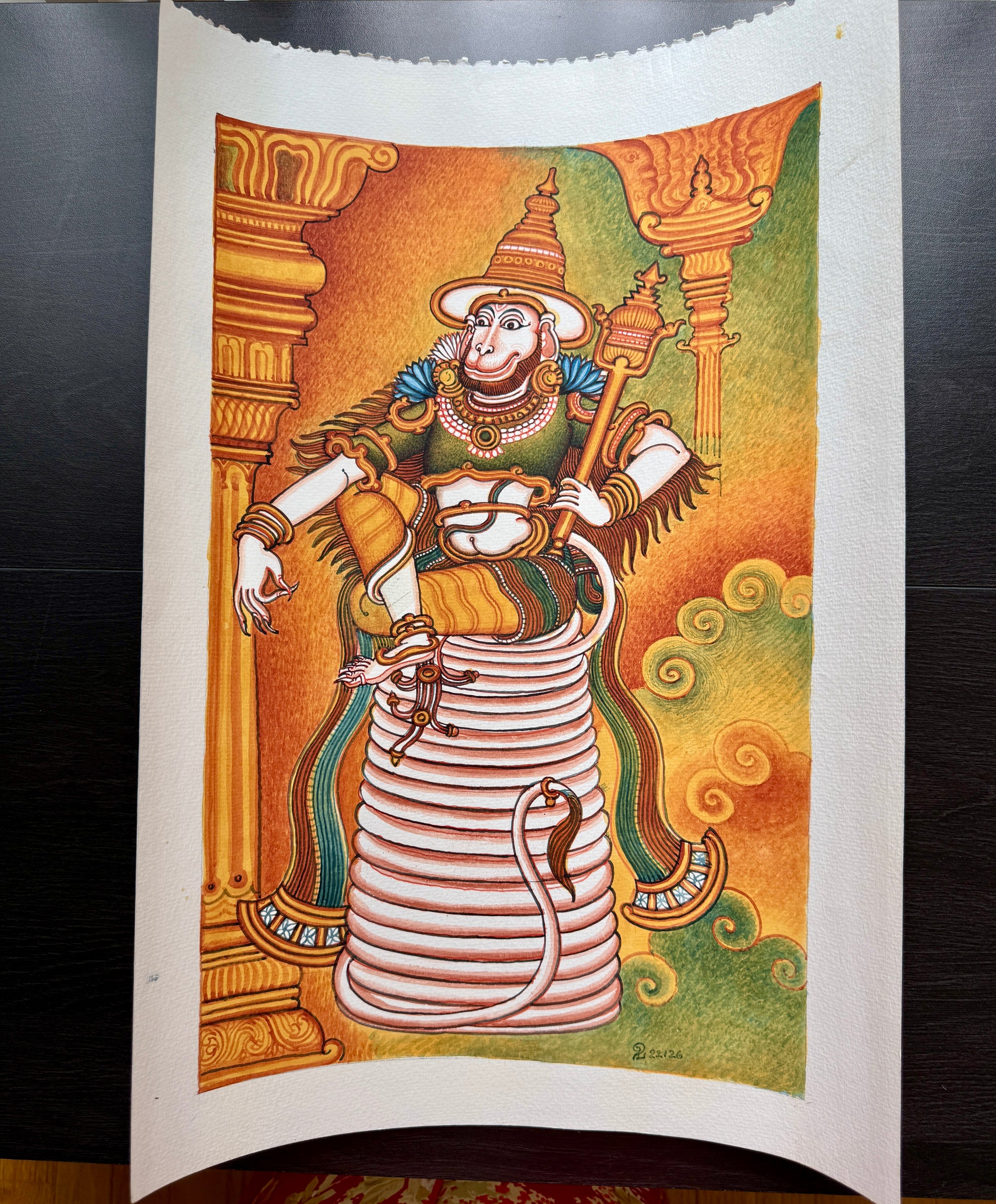 Colorful Kerala Mural painting of Hanuman sitting on a coil of his tail after burning Lanka, with ornate clothing and headdress on a dark background