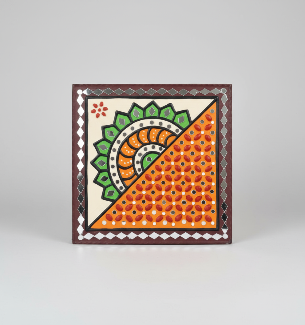 Decorative tile with geometric pattern on a white background