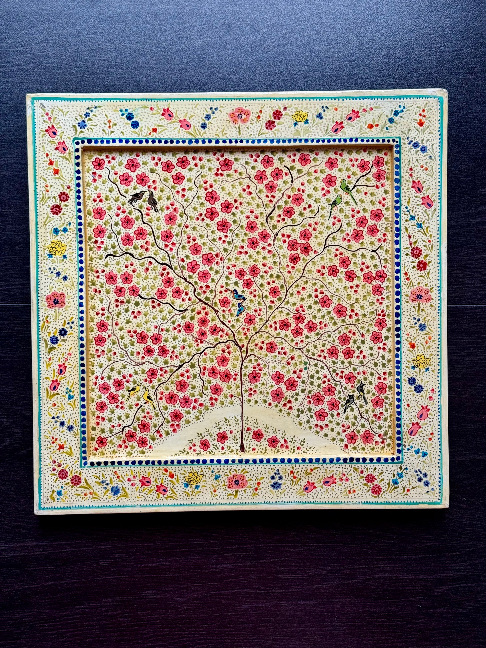 Kashmiri paper Mache Decorative square tray/wall piece  with floral pattern and tree design on a dark background