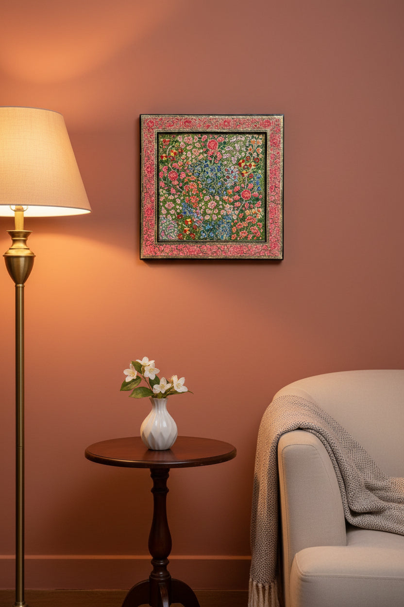 Decorative floral patterned Kashmiri paper Mache decorative tray with a colorful border on a dark background 