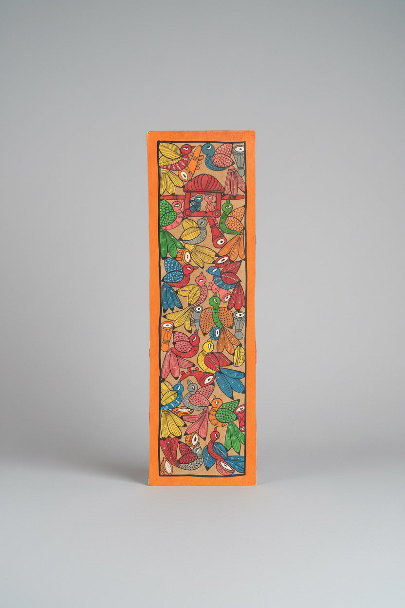 Bengal Pattachitra painting of bird-themed artwork on a gray surface