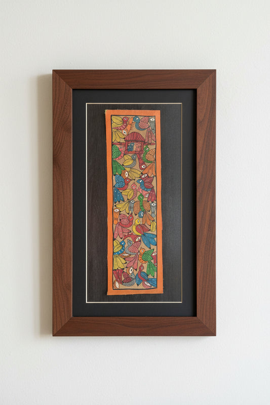 Colorful framed Bengal Pattachitra painting of bird artwork on an orange background
