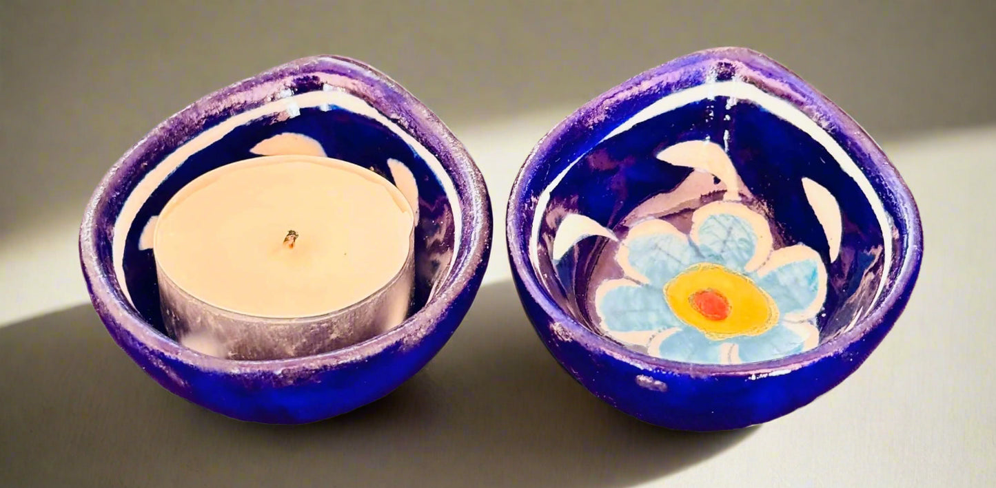 Handcrafted Jaipur Blue Pottery diyas, featuring intricate patterns and vibrant blue tones, perfect for adding a traditional Indian touch to your festive celebrations.