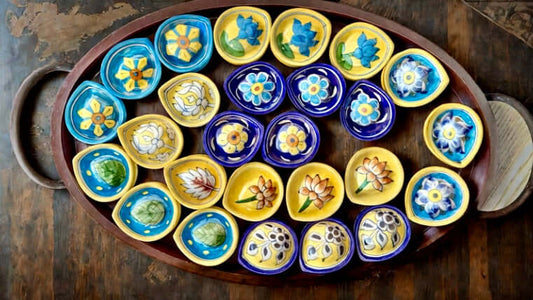 Handcrafted Jaipur Blue Pottery diyas, featuring intricate patterns and vibrant blue tones, perfect for adding a traditional Indian touch to your festive celebrations.