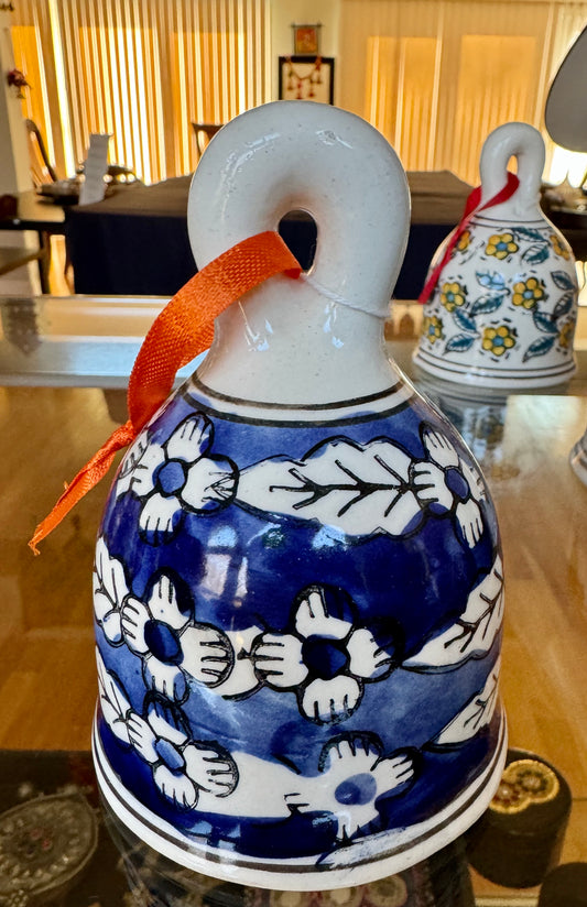 Handcrafted Jaipur Blue Pottery bells, featuring intricate designs and vibrant colors, perfect for adding a festive, traditional Indian touch to your Christmas and holiday decor.