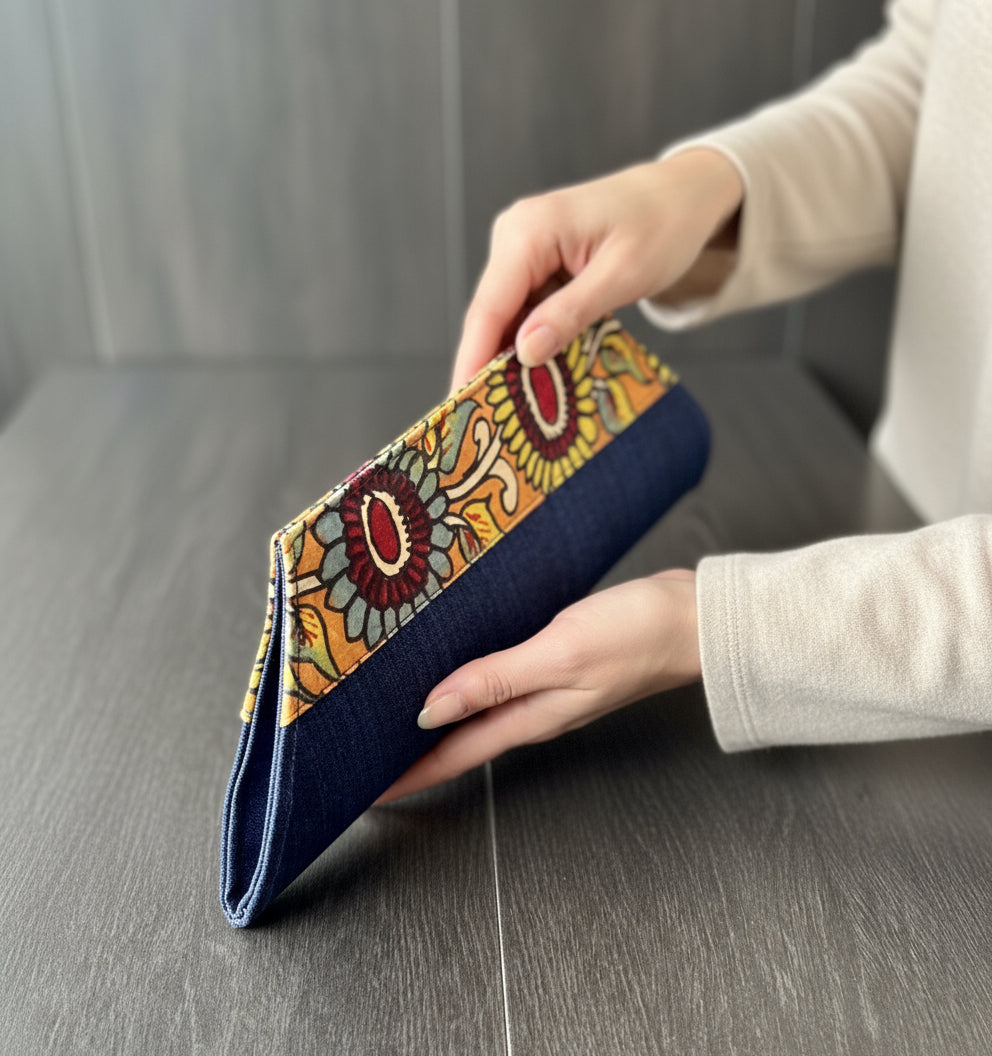 Blue Kalamkari bag on wood surface