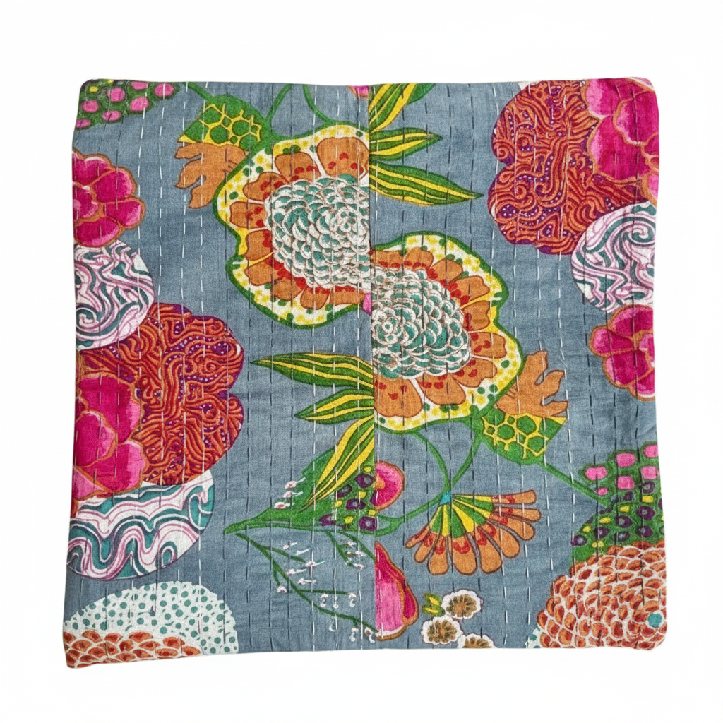 Colorful floral and paisley patterned fabric on a white background