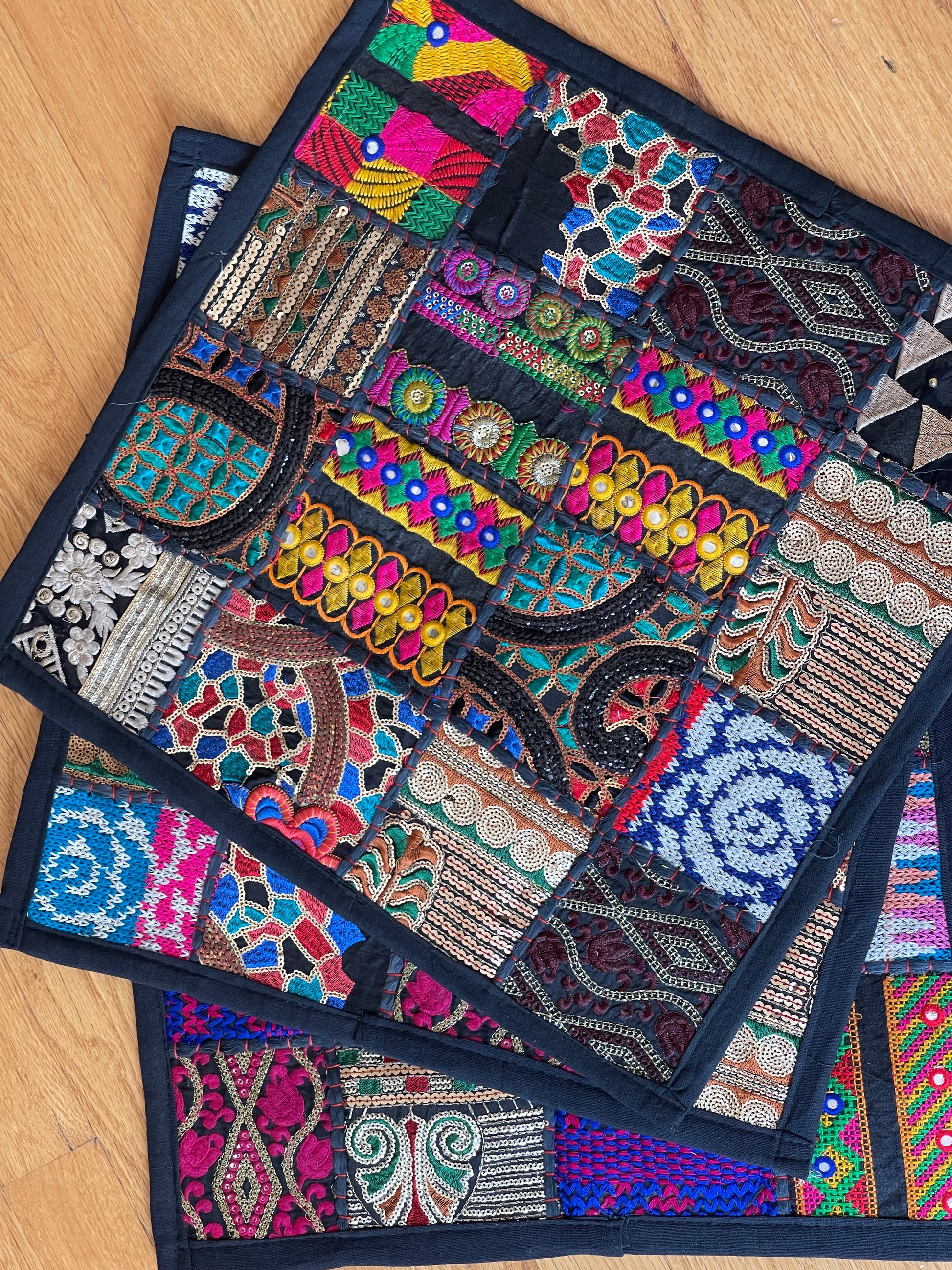 Handcrafted Kutchi Khambhadia work cushion covers, featuring vibrant patchwork and intricate embroidery, adding a touch of traditional Indian craftsmanship to your home decor.