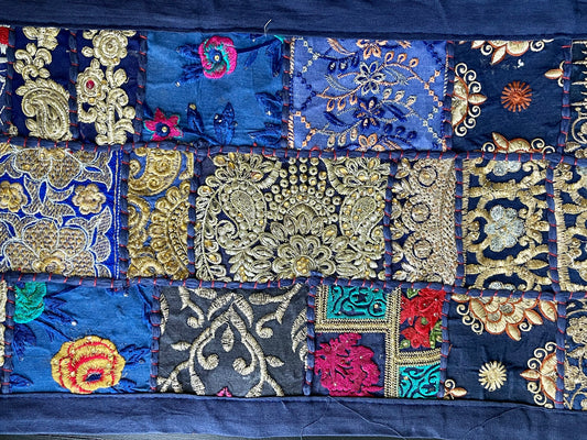 Handwoven Kutchi Khambhadia work table runners, featuring vibrant patchwork and intricate embroidery, adding a touch of traditional Indian craftsmanship to your table.