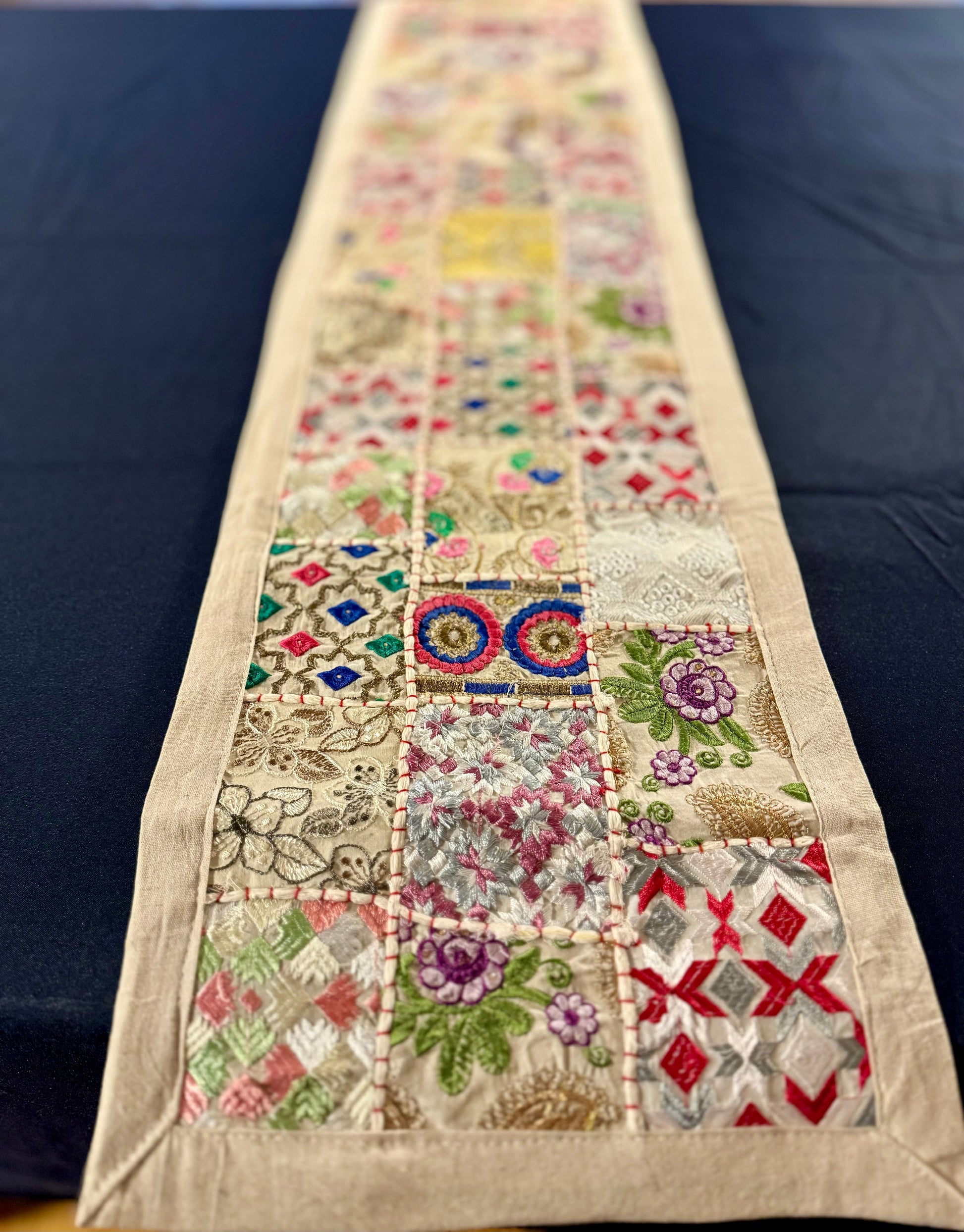 Handwoven Kutchi Khambhadia work table runners, featuring vibrant patchwork and intricate embroidery, adding a touch of traditional Indian craftsmanship to your table.