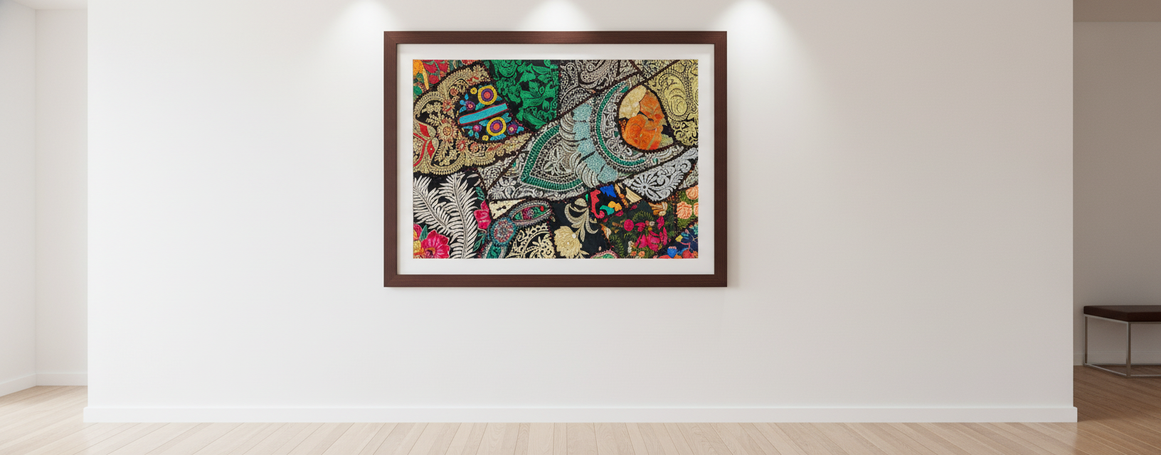 Colorful abstract painting in a wooden frame on a white wall.