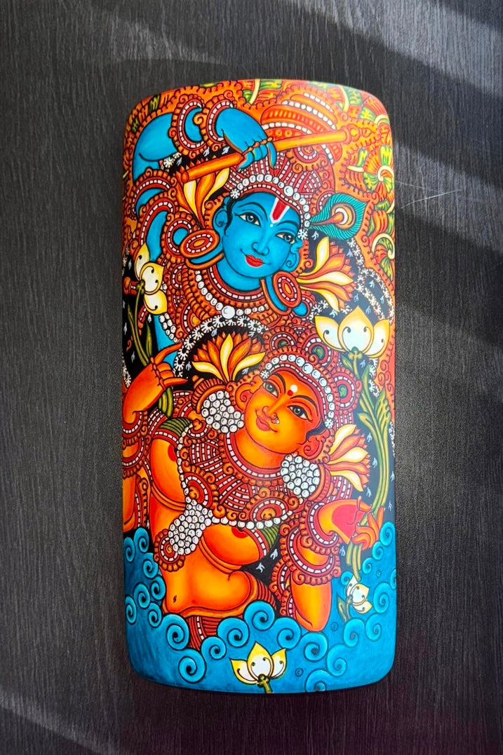 Krishna in Kerala mural art style bamboo wall decor with intricate designs on a dark surface