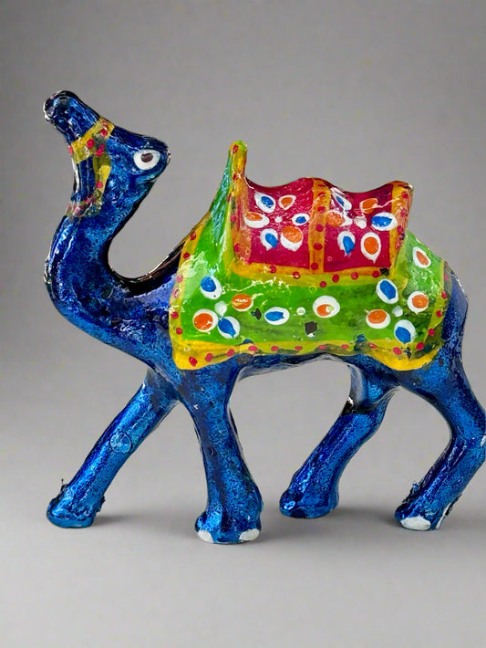 Colorful camel figurine with a price tag in the background