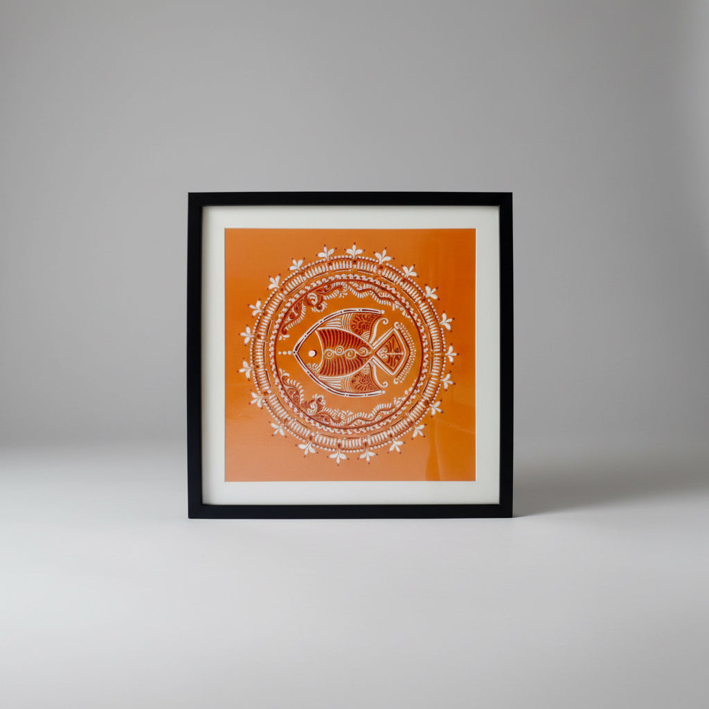 Decorative artwork in Alpona style with a fish symbol in the center on an orange background, framed in black.