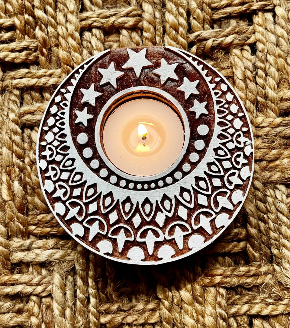 Decorative circular object with star and pattern design on a textured woven background