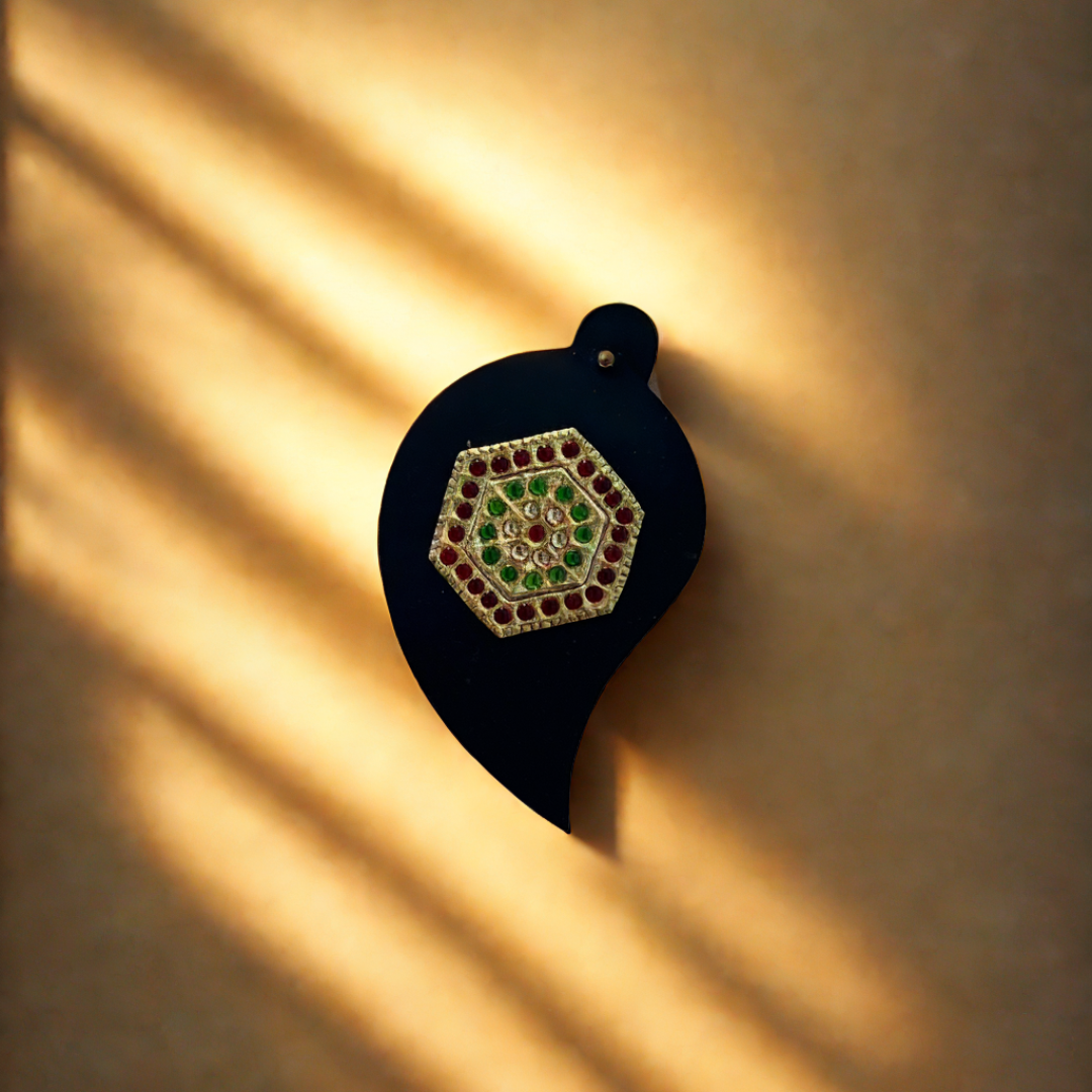Various shaped small wooden boxes adorned with Tanjore art, featuring intricate detailing and vibrant colors that add a touch of traditional elegance to your decor.