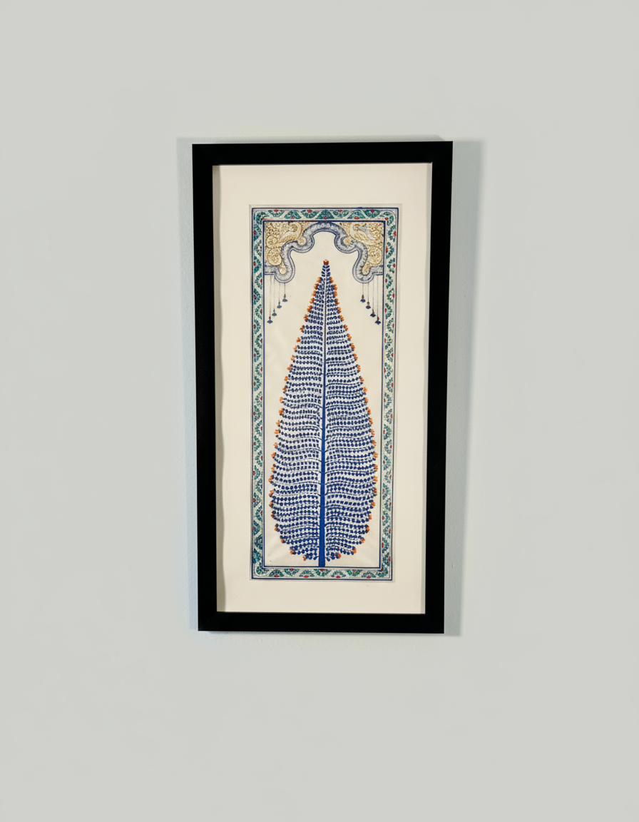 Framed artwork with a blue tree design on a beige background