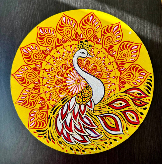 Hand-painted Alpona wall decor plate featuring intricate traditional motifs inspired by Bengali folk art. A stunning blend of cultural heritage and craftsmanship to elevate your home decor.