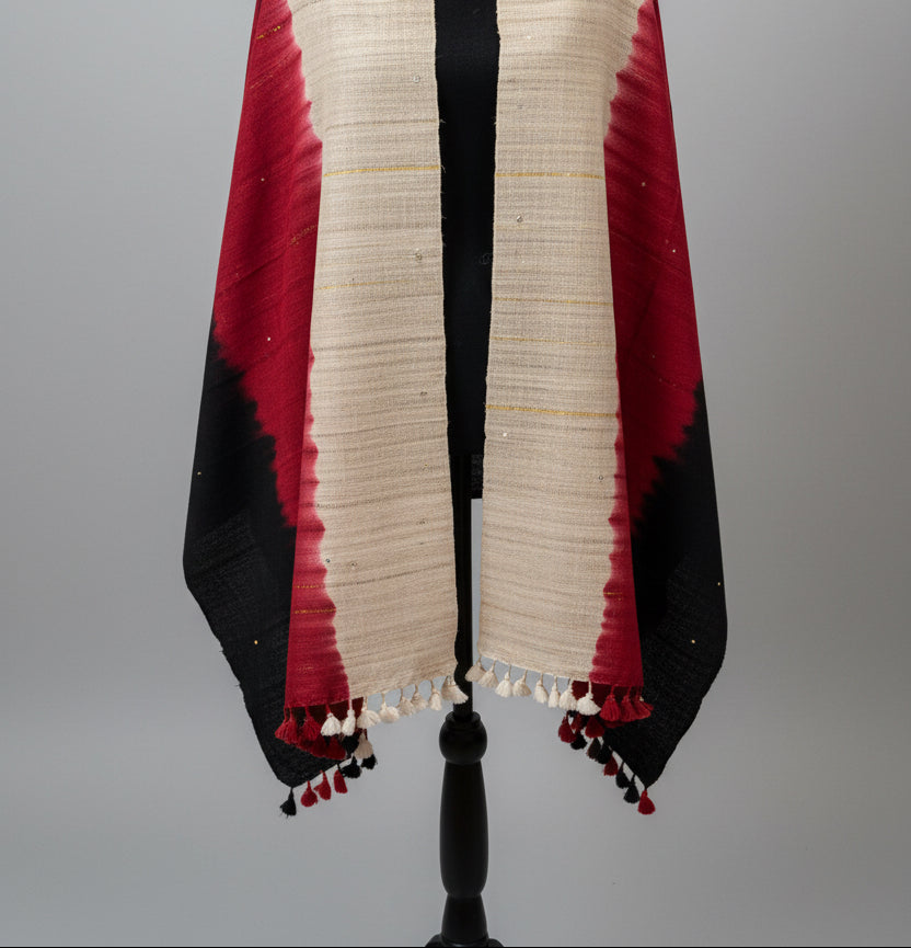 Raw silk stole with red, black, and beige pattern on a gray background