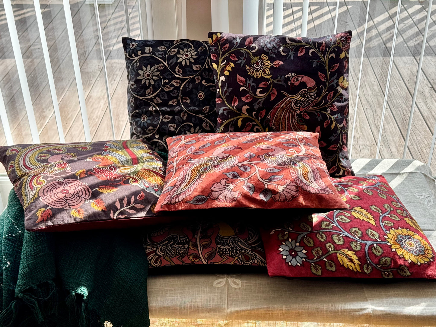Hand-painted Kalamkari cushion covers featuring intricate traditional motifs and rich natural dyes. A perfect blend of heritage craftsmanship and artistic elegance to enhance your home decor.