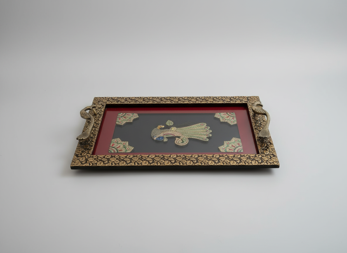Decorative framed piece with intricate design on a plain background
