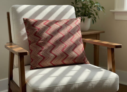 Silk cushion cover with intricate hand block print design, featuring traditional patterns and rich colors on a smooth, lustrous fabric